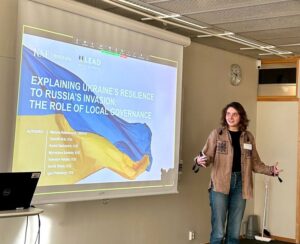 Myroslava Savisko presenting a related research project (Darkovich, Savisko and Rabinovych, 2023) during the conference "How to be prepared? Governance for Societal Resilience in the Baltic Sea Region and Eastern Europe".